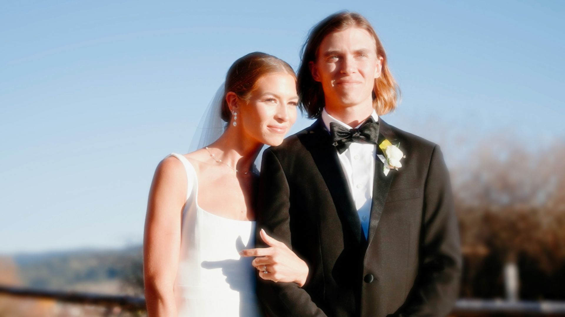 a man and a woman standing next to each other