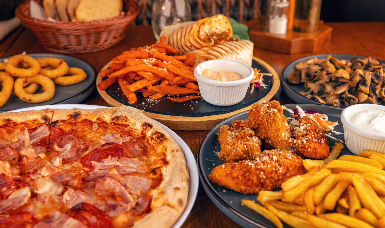 Brunch table setting with different delicious food in restaurant