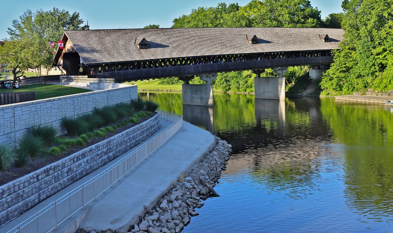 The Holz Brucke Covered Bridge in Frankenmuth Michigan and the Cass River.