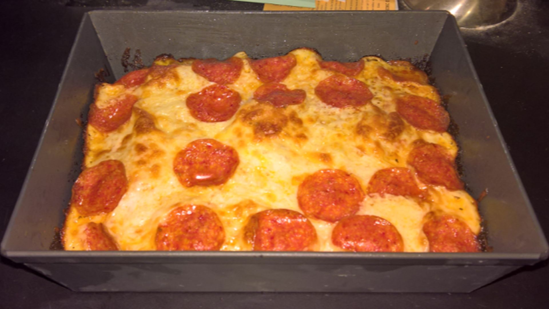 Detroit Style Pizza in Lloyds Detroit Style Pan