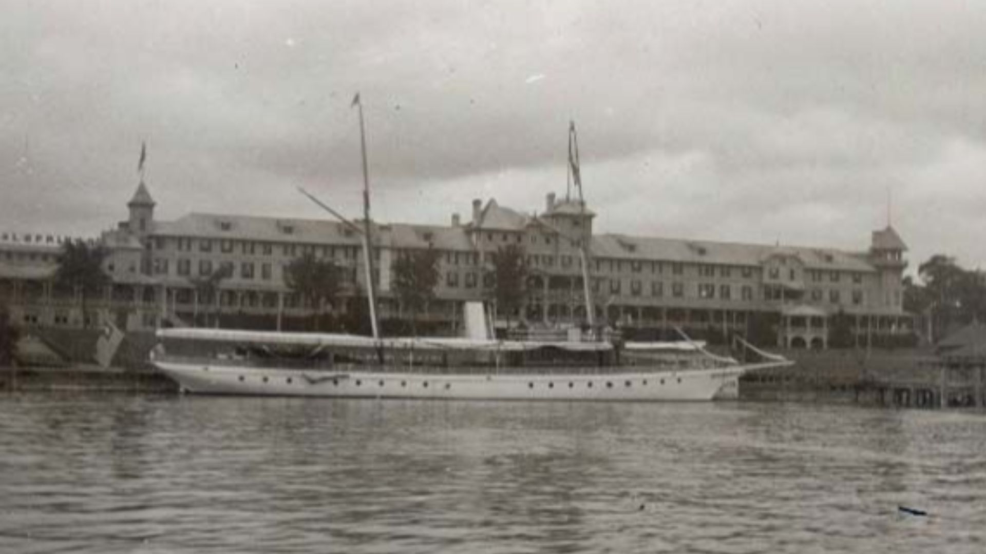 From the Antone S. Zeitler photograph album, an early twentieth century view of the Grand Hotel at Mackinac Island, Michigan. An excursion boat, the Sigma, is docked at the pier in front of the hotel. Terms associated with the photograph are: piers | Sigm