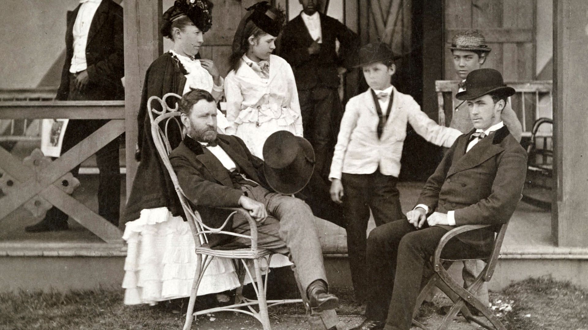 Ulysses Grant and Family at Long Branch, NJ by Pach Brothers, NY, 1870.  The Imperial Cabinet Card pictures Grant and wife, Julia Dent, and their four children; Jesse, Ulysses Jr., Nellie, and Frederick in front of their cottage. Also present are two blac