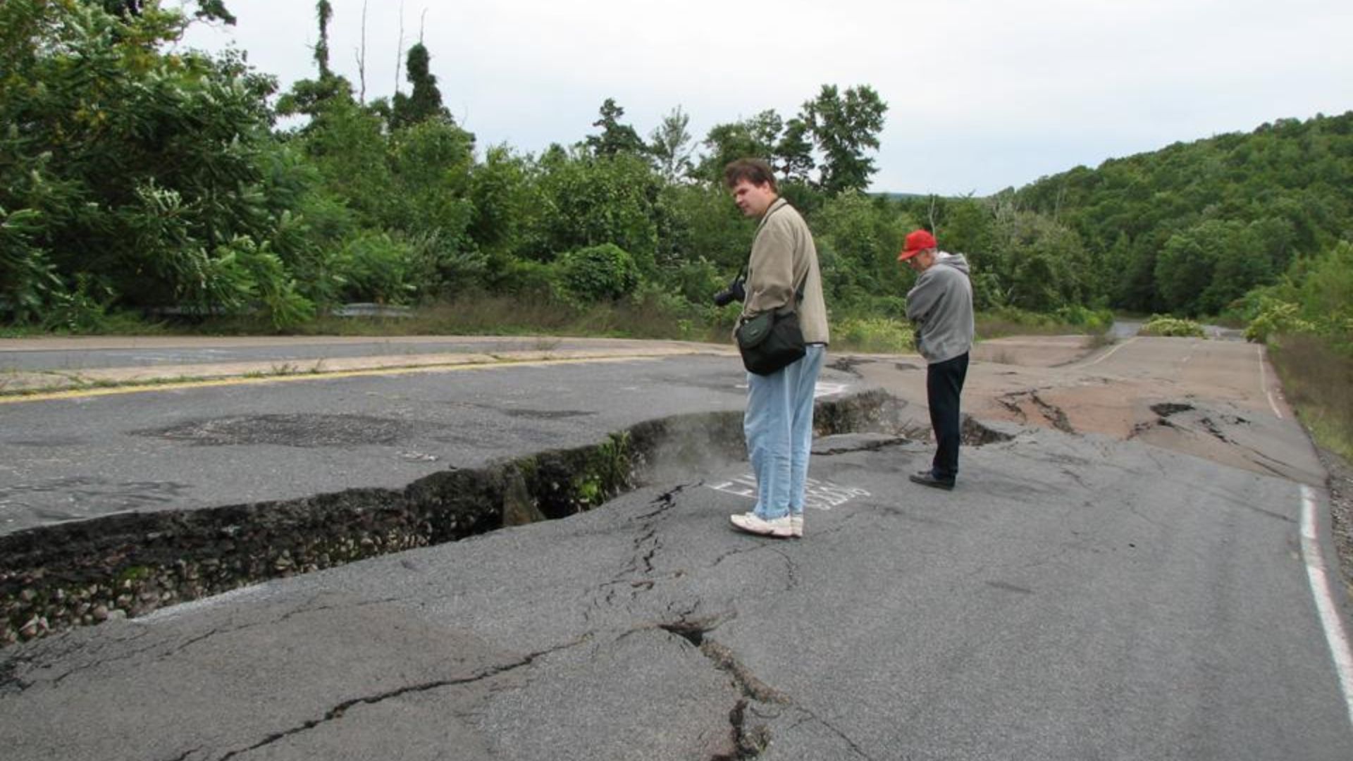 Centralia Underground Coal Fire, as seen in summer 2006. (looking ~southwest) (hominids for scale)
Centralia, Pennsylvania is a famous place for observing the effects of an underground coal fire.  The fire started in 1962, and for many years, smoke & fume