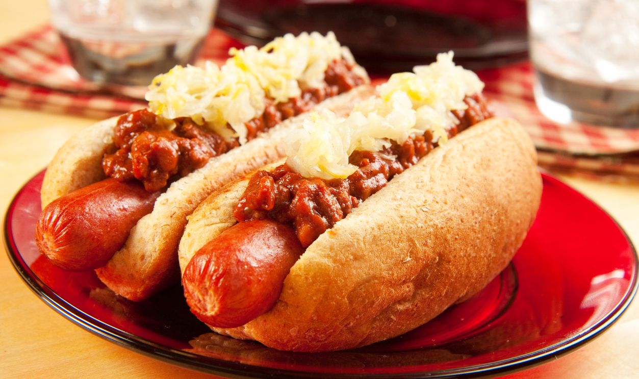 Perfect for the big game,  picnic, party or anytime, chili dogs with sauerkraut.