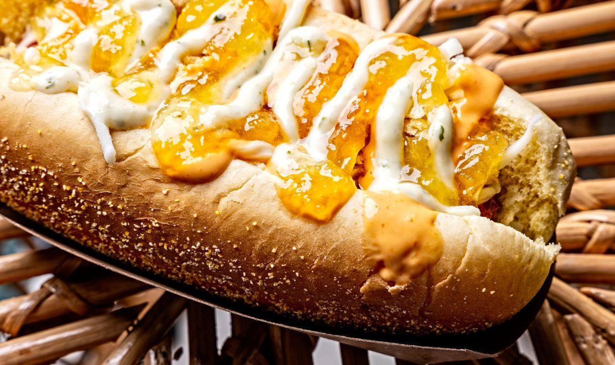 GAITHERSBURG, MD- JULY 3: The Perro Caliente (Hot Dog) at La Poteria Local photographed July 3, 2023 in Gaithersburg, MD.