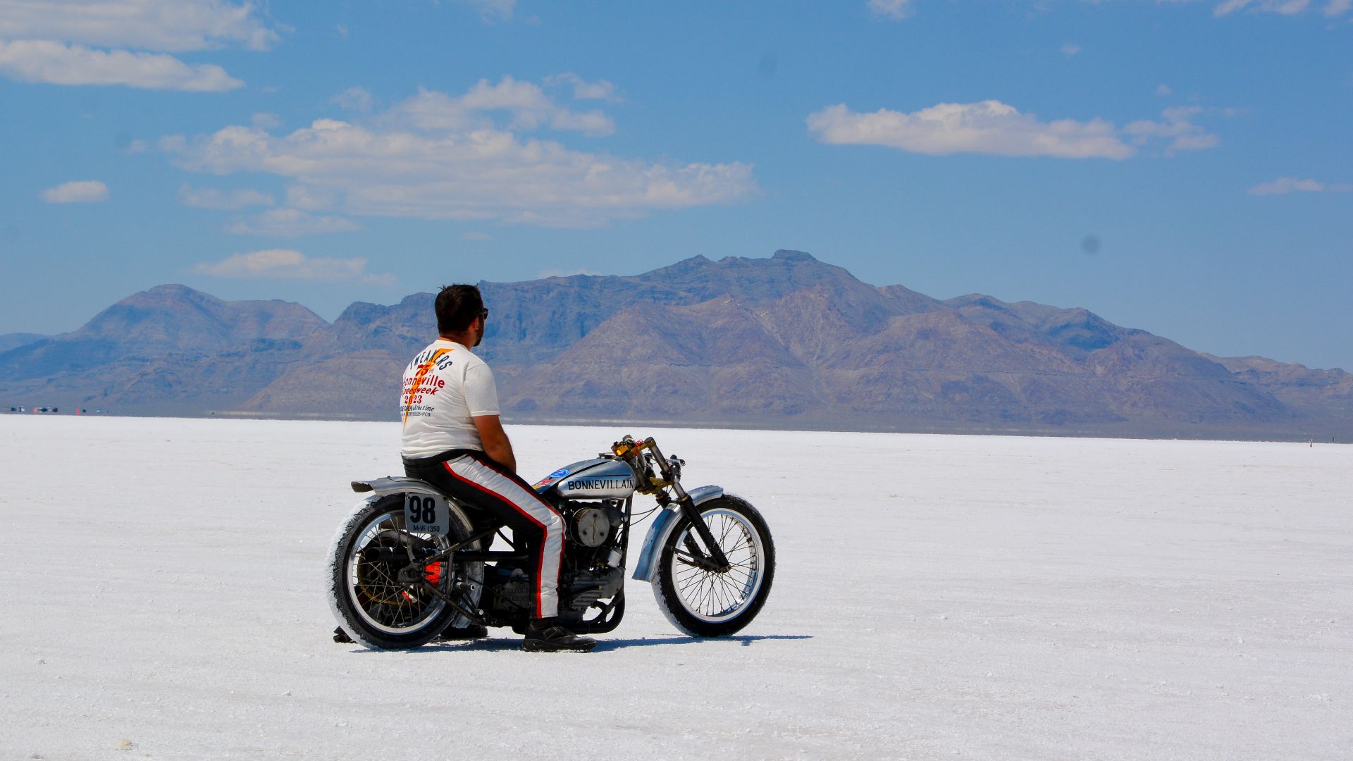 Motorcyclist sits on top of a motorcycle after a race during Speedweek 2023 on the Bonneville Salt Flats in Wendover, UT.
Photo by: Jonathan Mallory