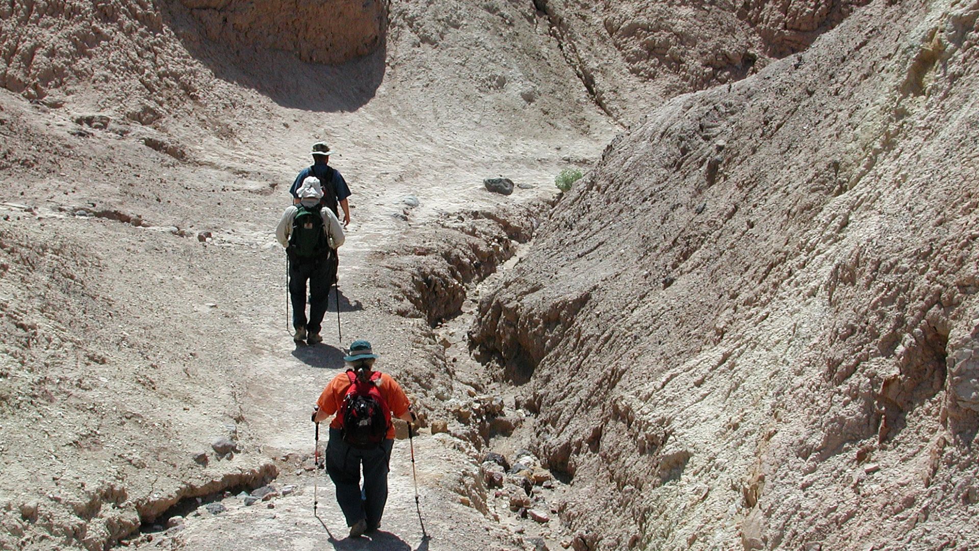 Hikers entering Gower Gulch, west of Zabriskie Point in Death Valley National Park.