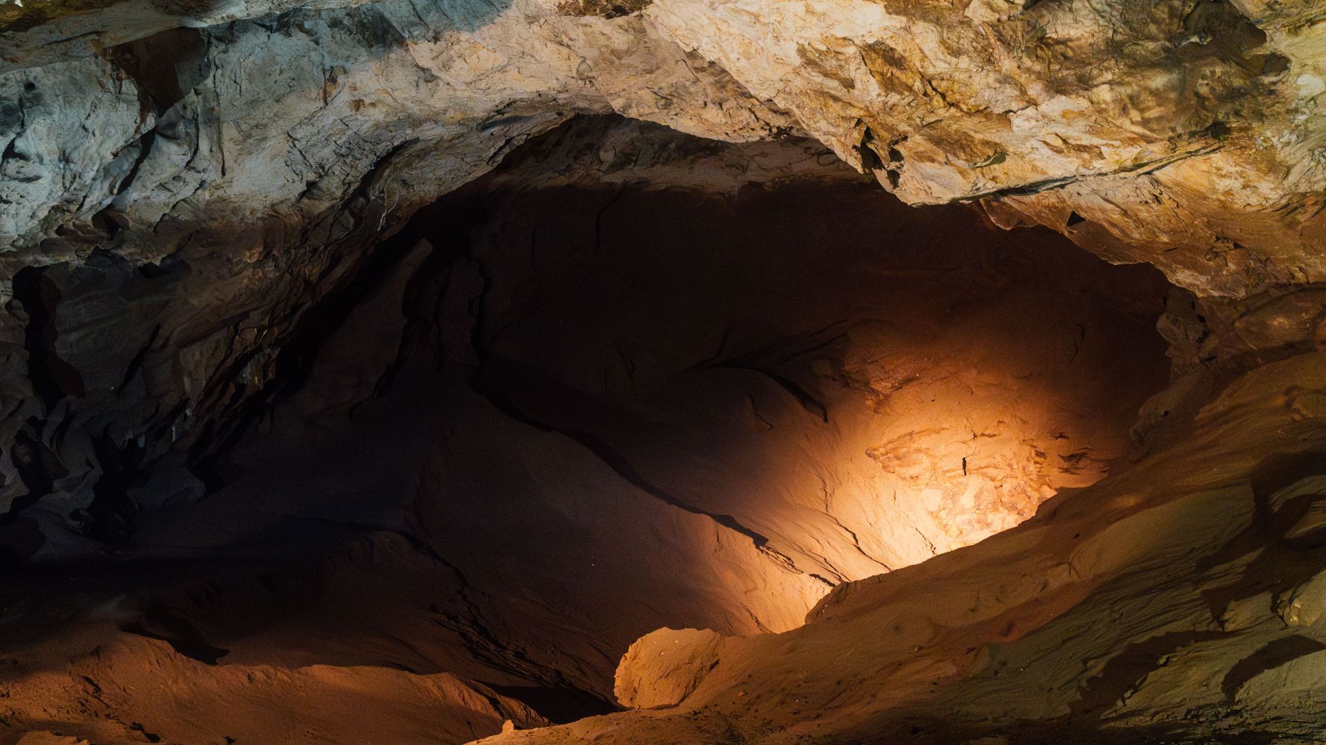 Explore the stunning rock formations inside a cave in New Athos, Abkhazia.