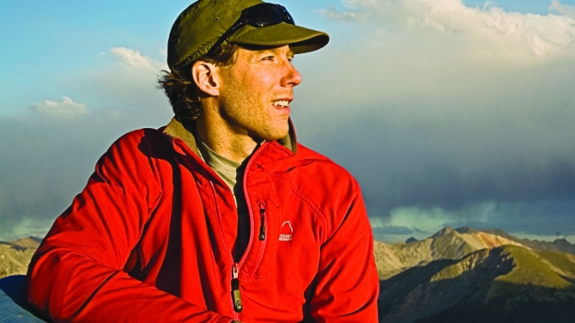 Digital photograph of Aron Ralston in a red jacket at sunset, in the mountains of Central Colorado, near Independence Pass (Aspen), CO