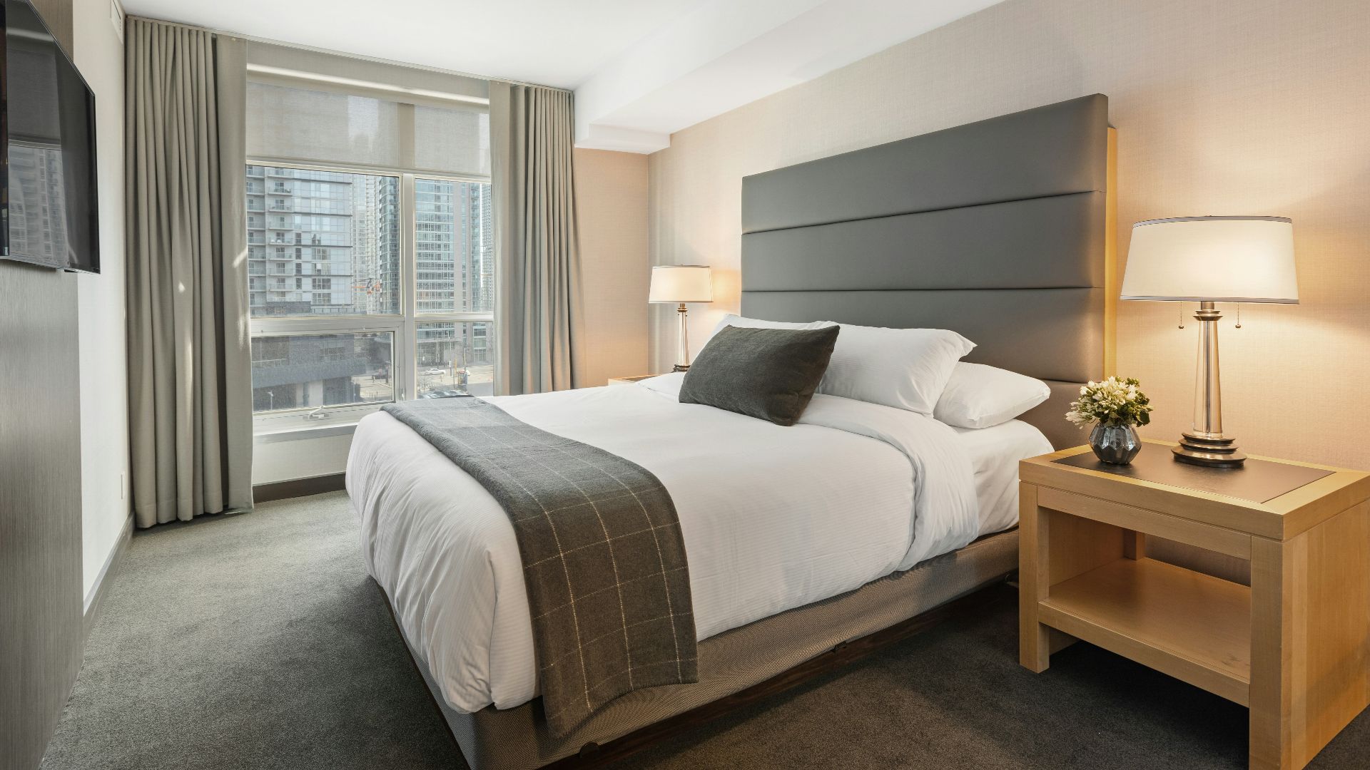 white bed linen on bed