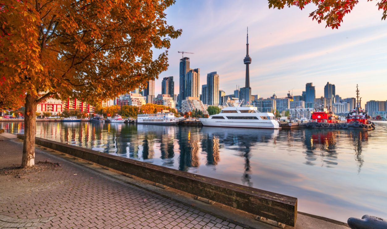 Toronto, Ontario, Canada downtown city skyline at twilight in autumn season.