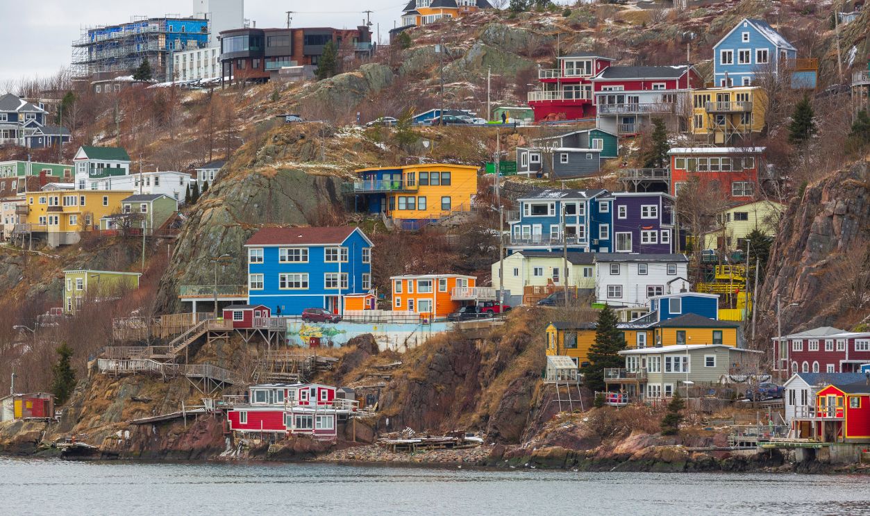 St. John's, Newfoundland and Labrador, Canada. December 25, 2024: After heavy snow, St. John's Harbor, colorful wooden houses on the coast.
