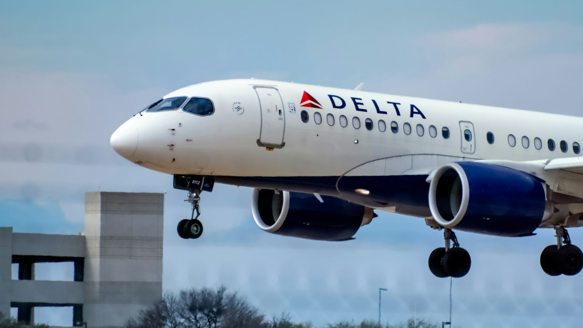 white passenger plane in the sky during daytime