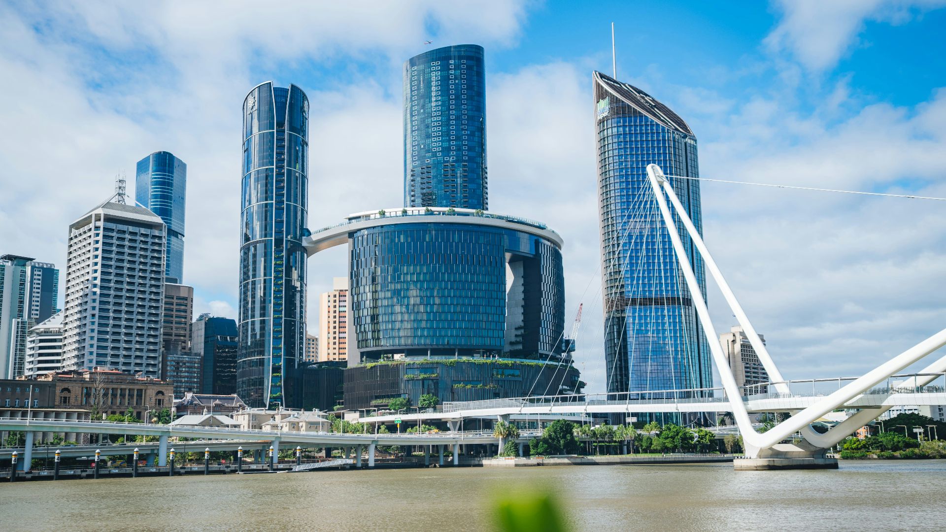 Modern skyscrapers and the Kurilpa Bridge over the Brisbane River in Brisbane