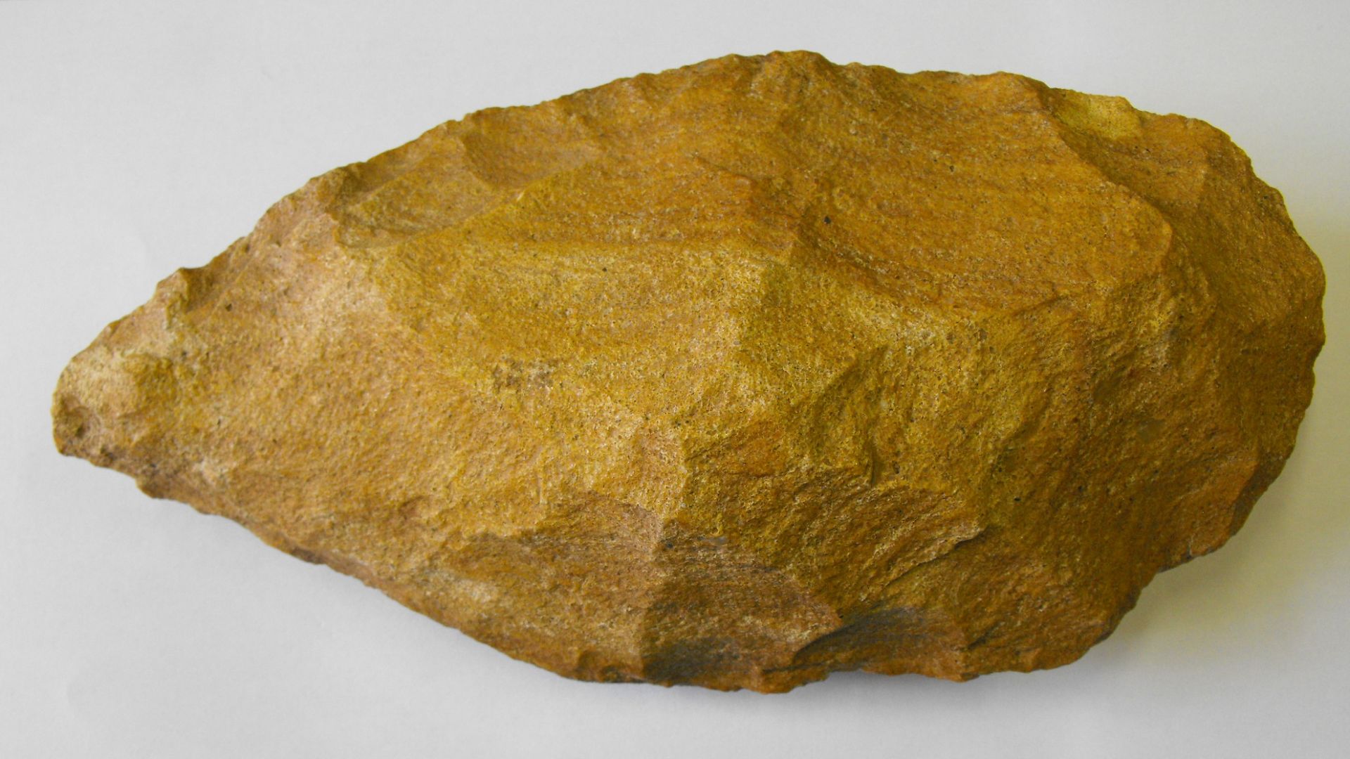 A large quartzite hand axe of Palaeolithic date.
Dr. Bill Boismeyer, of Northamptonshire Archaeology has seen the hand axe and has confirmed its Palaeolithic date. Dr. Nick Ashton of the British Museum has also commented, stating that quartzite handaxes a