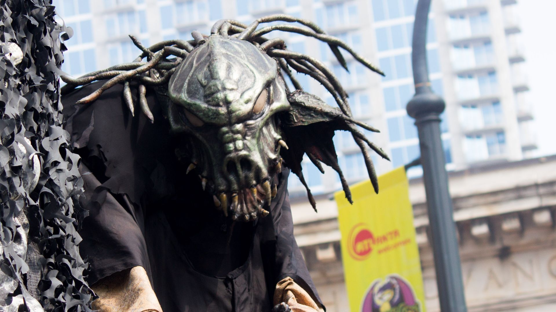 People representing The Netherworld haunted house taking part in the 2013 Dragon*Con parade through Atlanta.