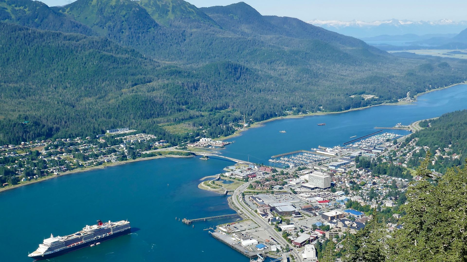 MS Queen Elizabeth in Juneau, Alaska on 15 August 2024. Downtown Juneau at right.