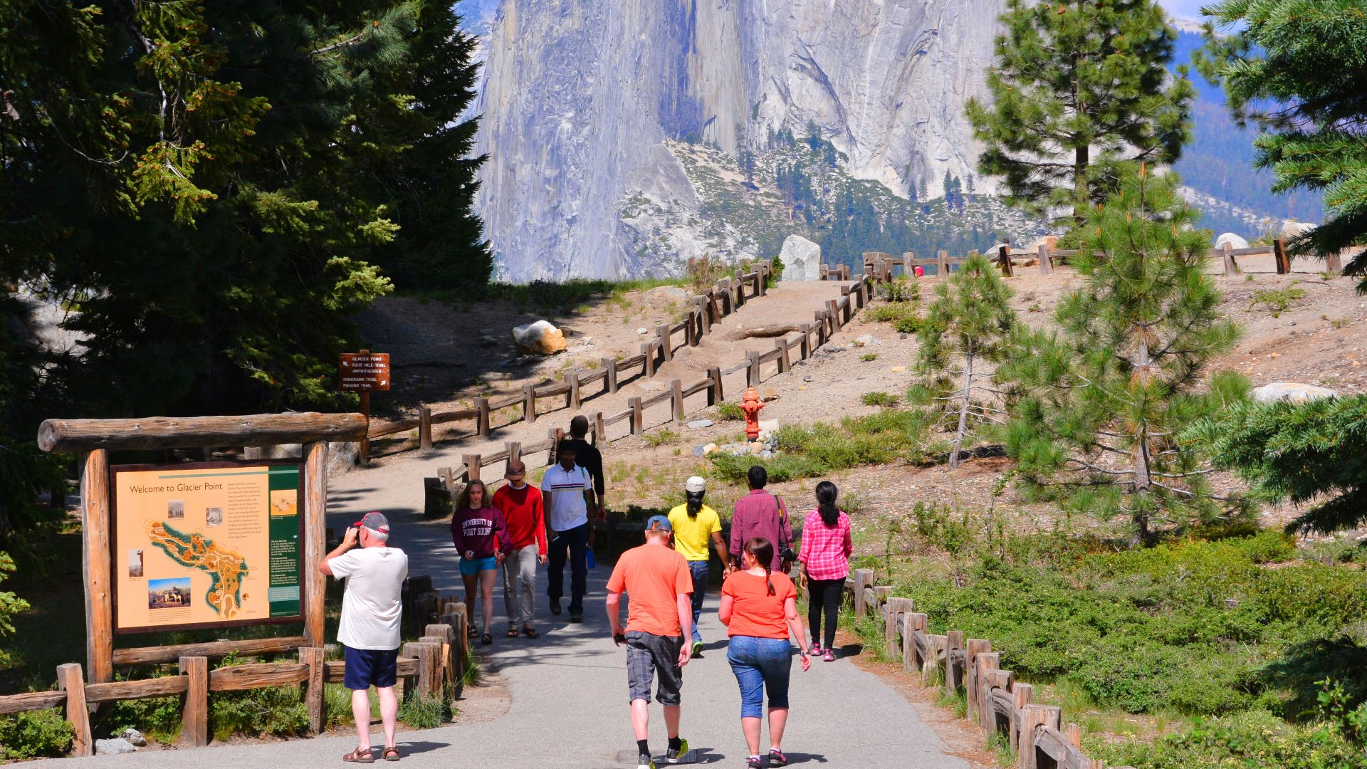 Glacier point is a spectacular viewpoint sitting 3000 feet above Yosemite Valley.
You get great views of many parts of the National Park, including awesome Half Dome (in this picture).
Here tourists make the short walk from the car park to the viewpoint.