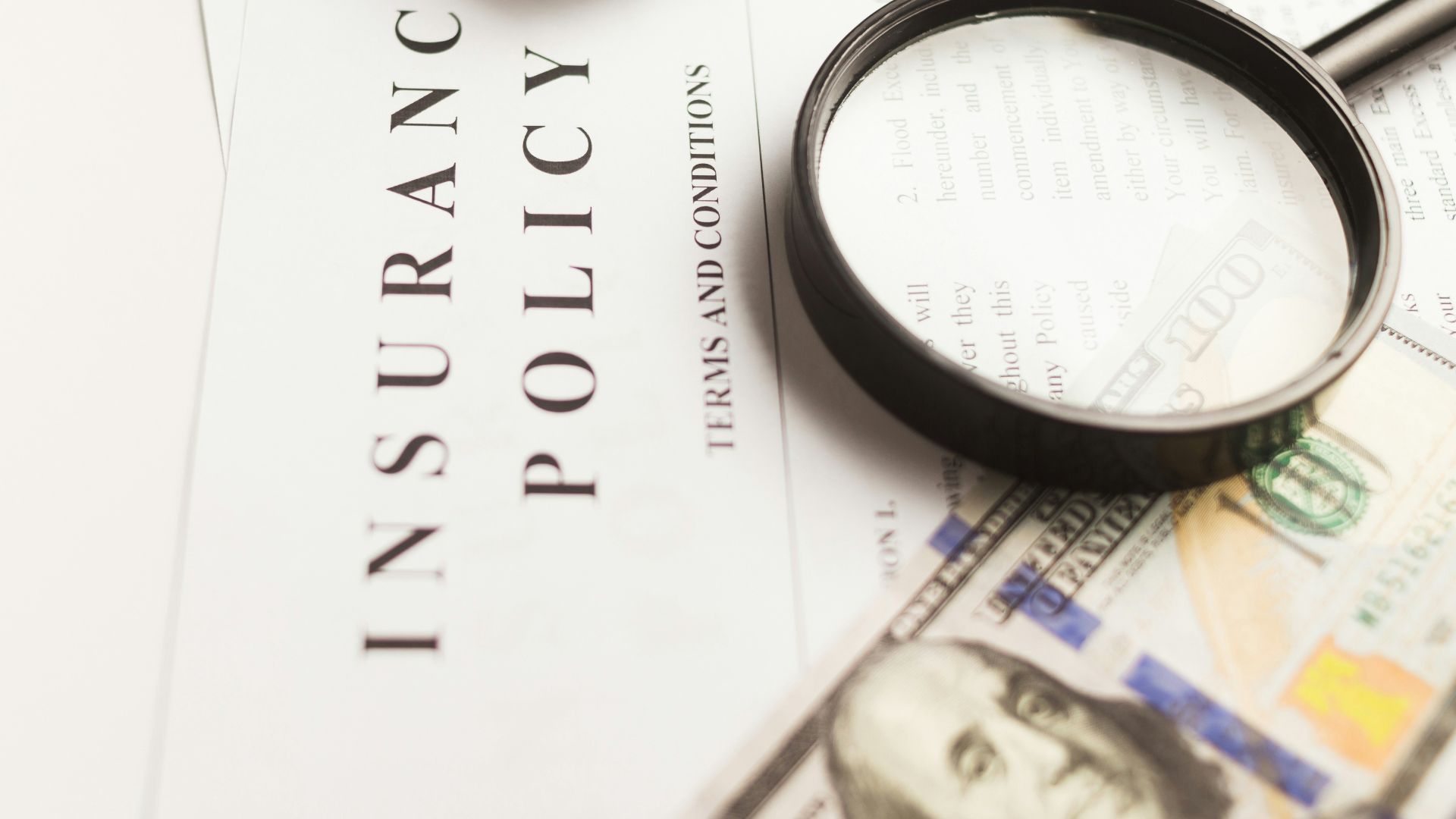 a magnifying glass sitting on top of a piece of paper