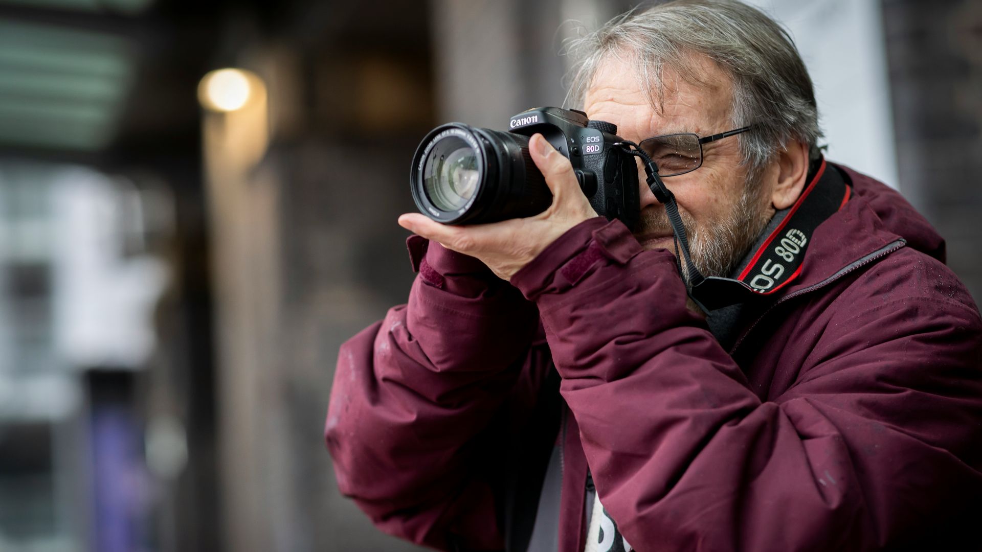 a man taking a picture with a camera