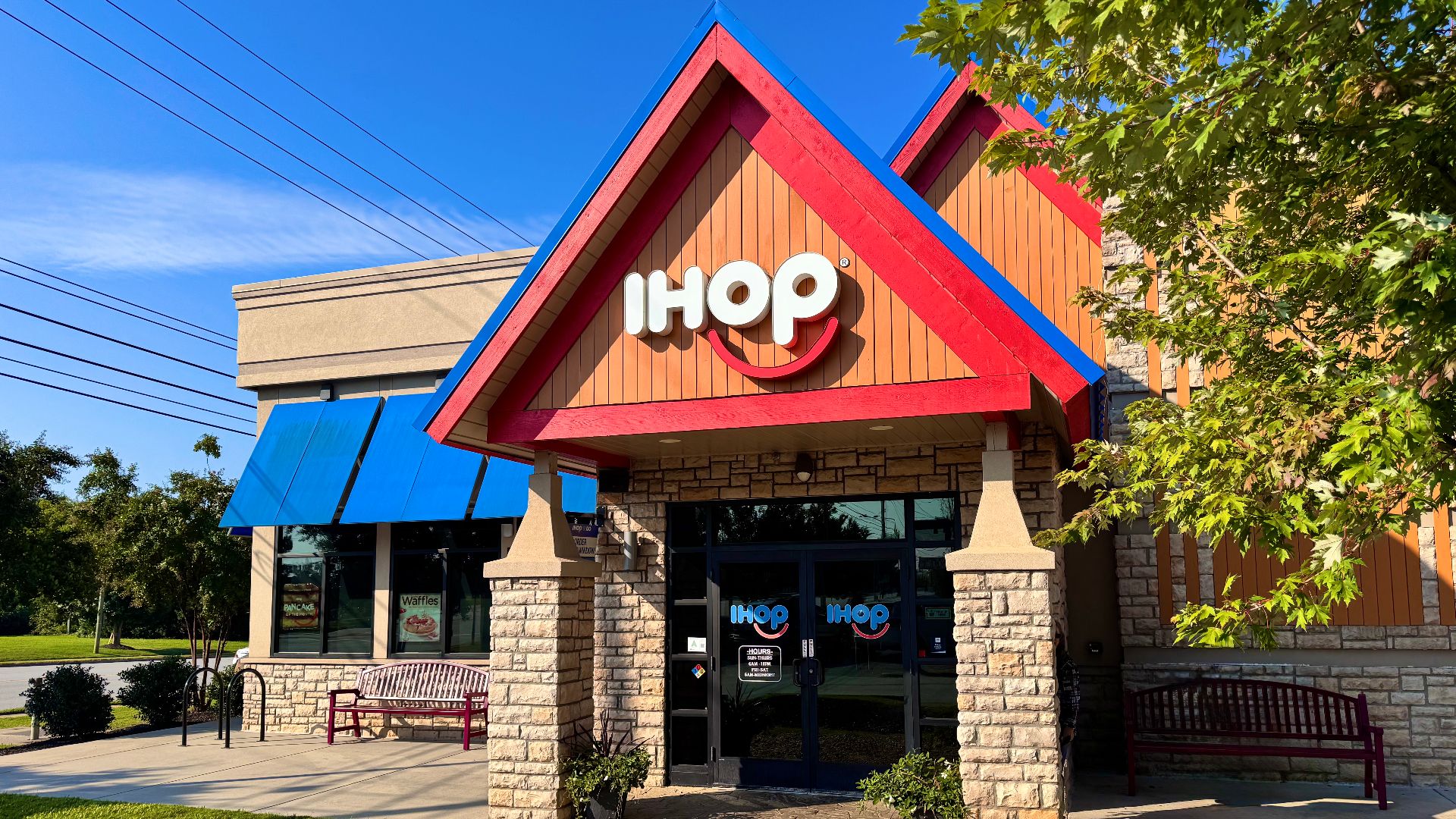 The exterior of a modern IHOP (or International House of Pancakes) restaurant in Greenville, South Carolina