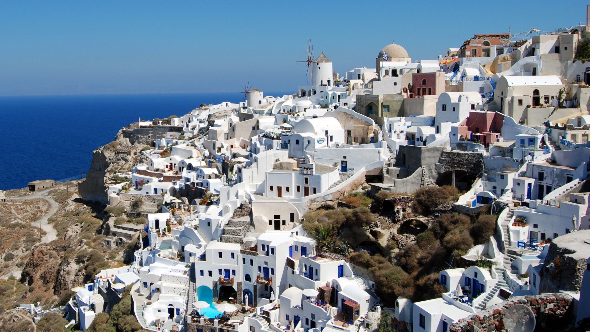 Santorini (Greek: Σαντορίνη, pronounced [ˌsa(n)do̞ˈrini]) is a small, circular archipelago of volcanic  islands  located in the southern Aegean Sea, about 200 km (120 mi) southeast from Greece's mainland. The largest island is known as Thēra (or Thira, Gr