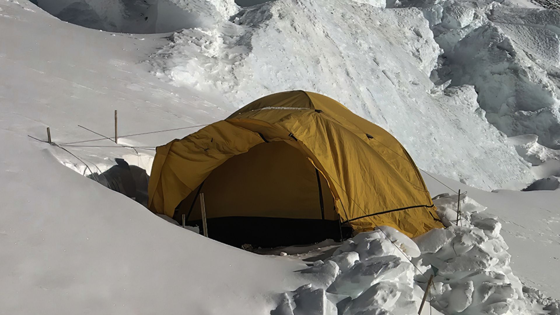 High-altitude tents at Everest’s Camp 3 (7,200m) serve as temporary shelters for climbers attempting to summit Mt. Everest. This picture was taken in Camp 3 of Mt.everest with background of Mt. Lhotse, which falls in Sagarmatha National Park
