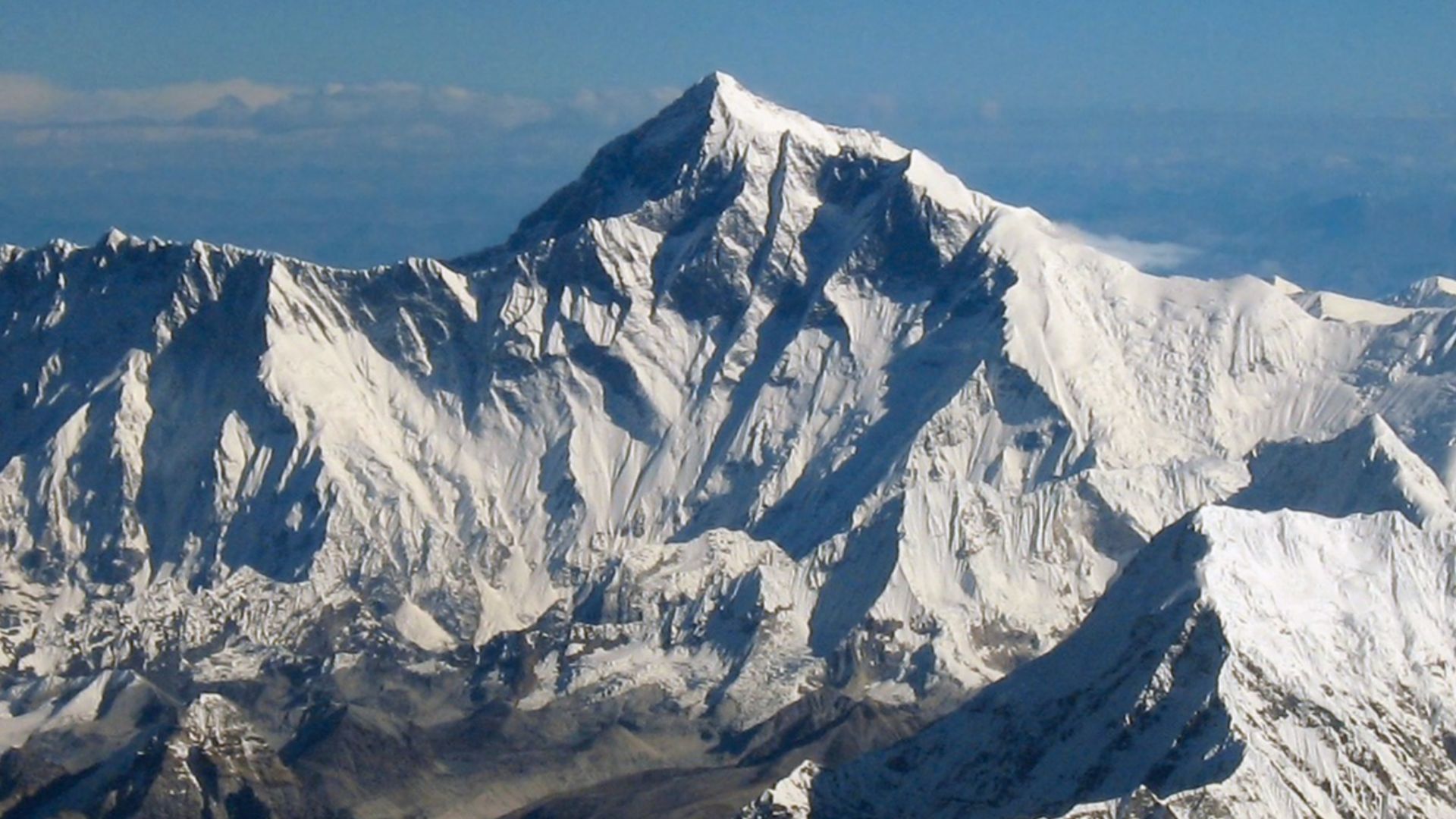 View northward to Mount Everest from an aircraft from airline company Drukair in Bhutan. The aircraft is south of the mountains, directed north.