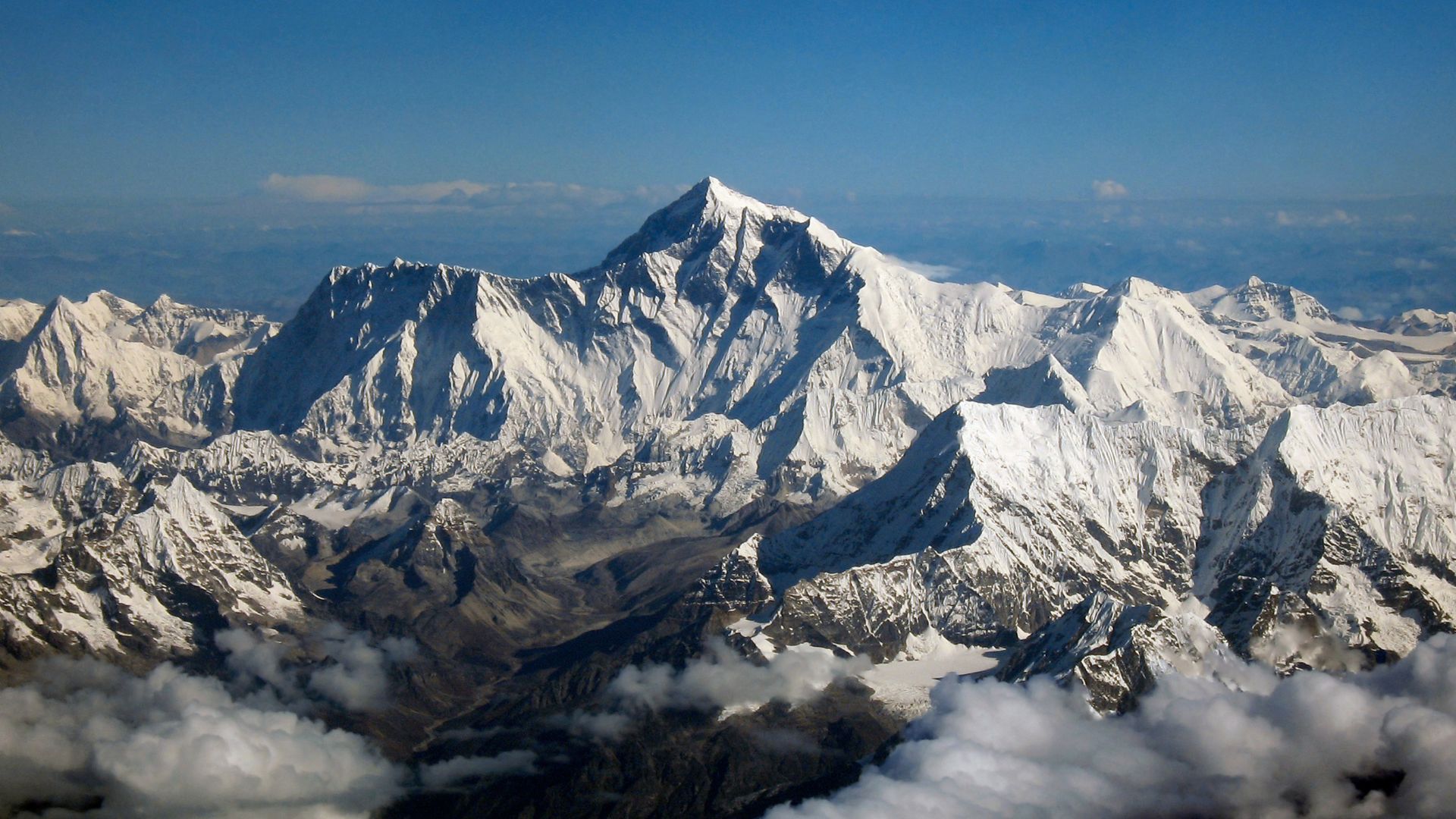 Mount Everest as seen from the aircraft of Drukair in Bhutan. The aircraft is south of the mountains, facing north.