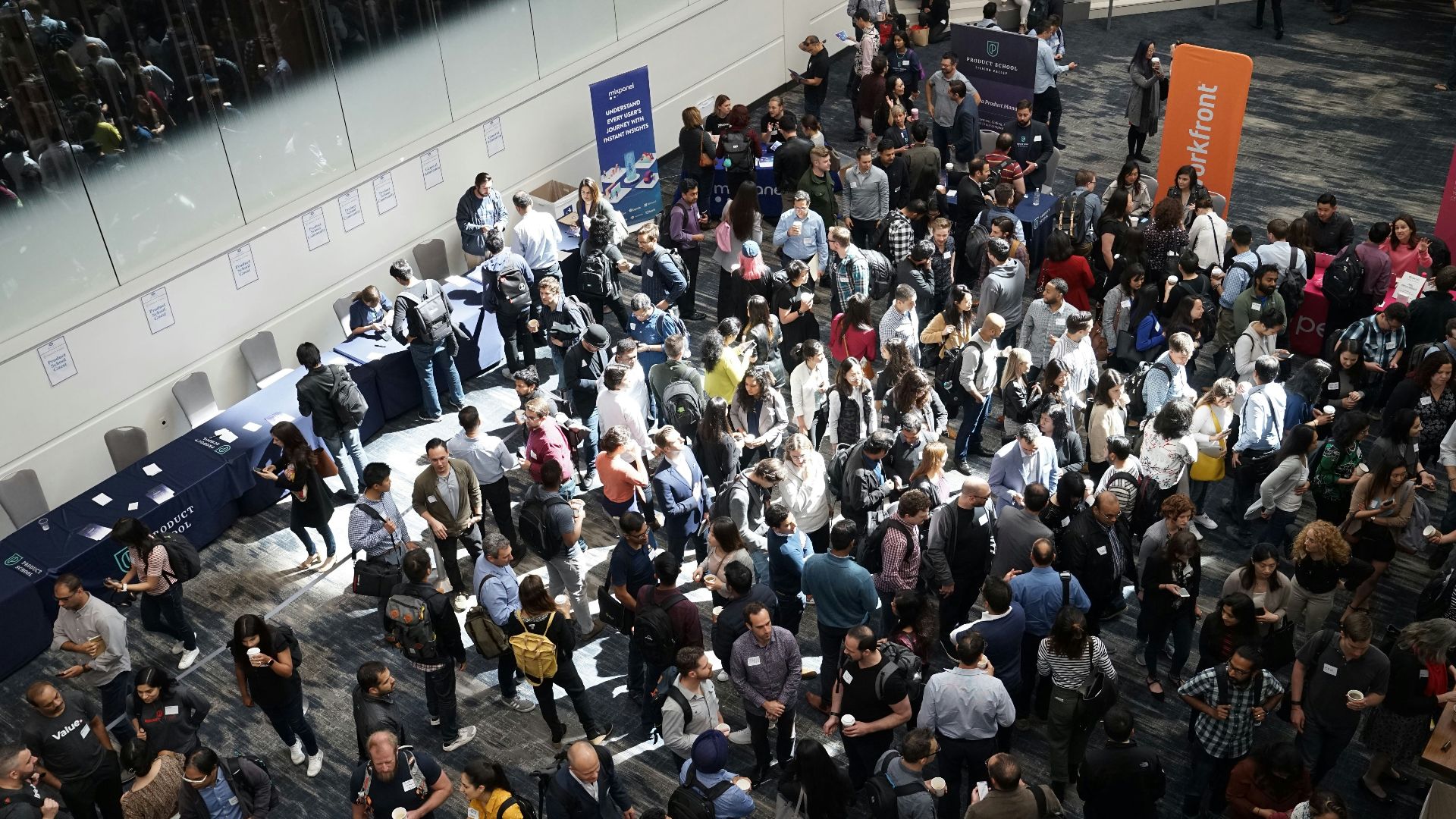 crowd of people in building lobby