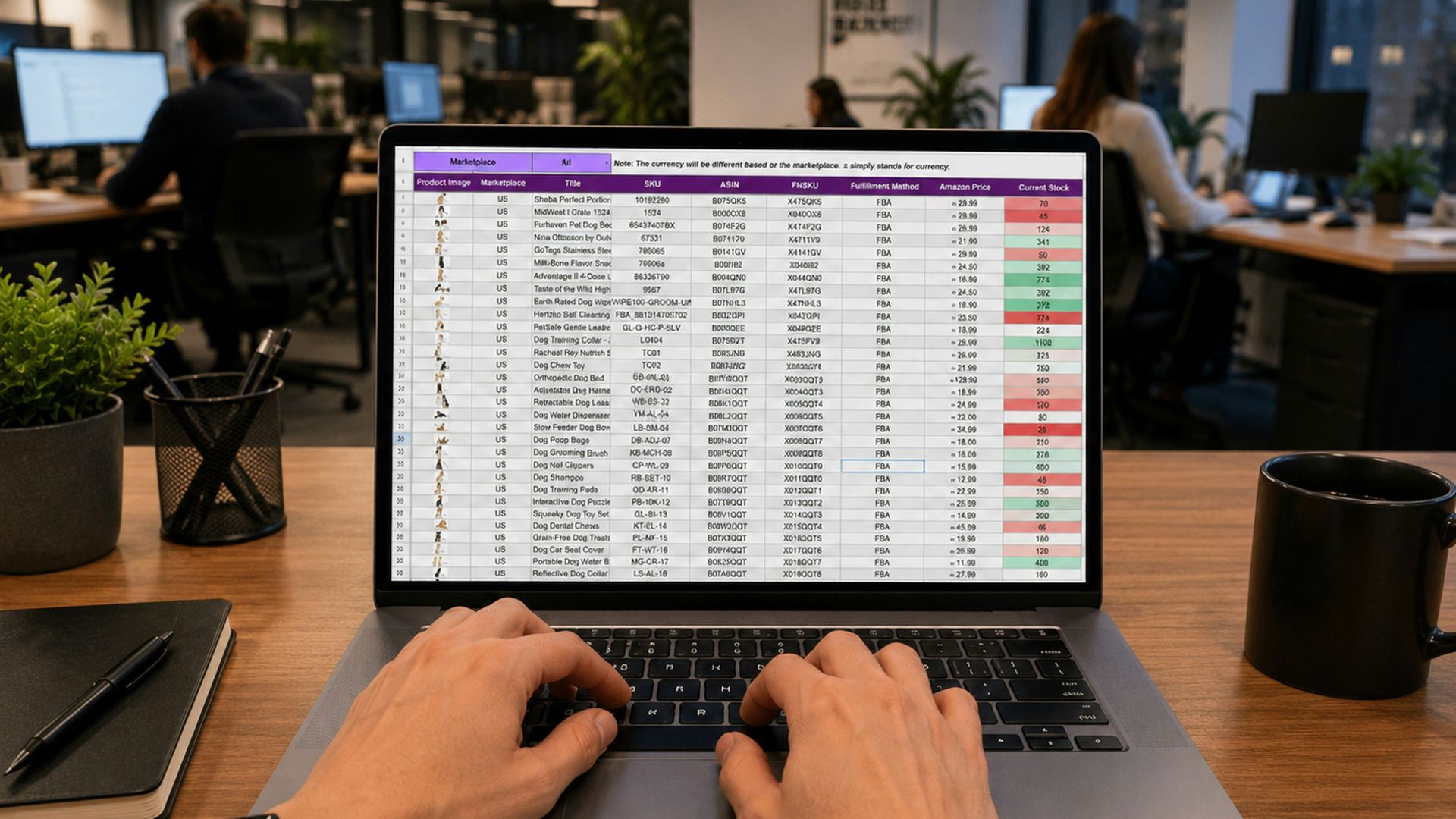 Hands typing on a laptop displaying a data spreadsheet