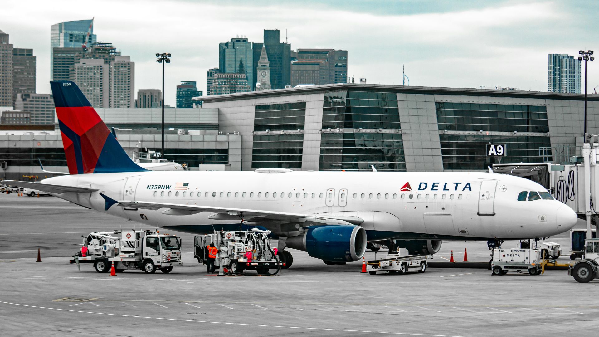 white passenger plane on airport during daytime