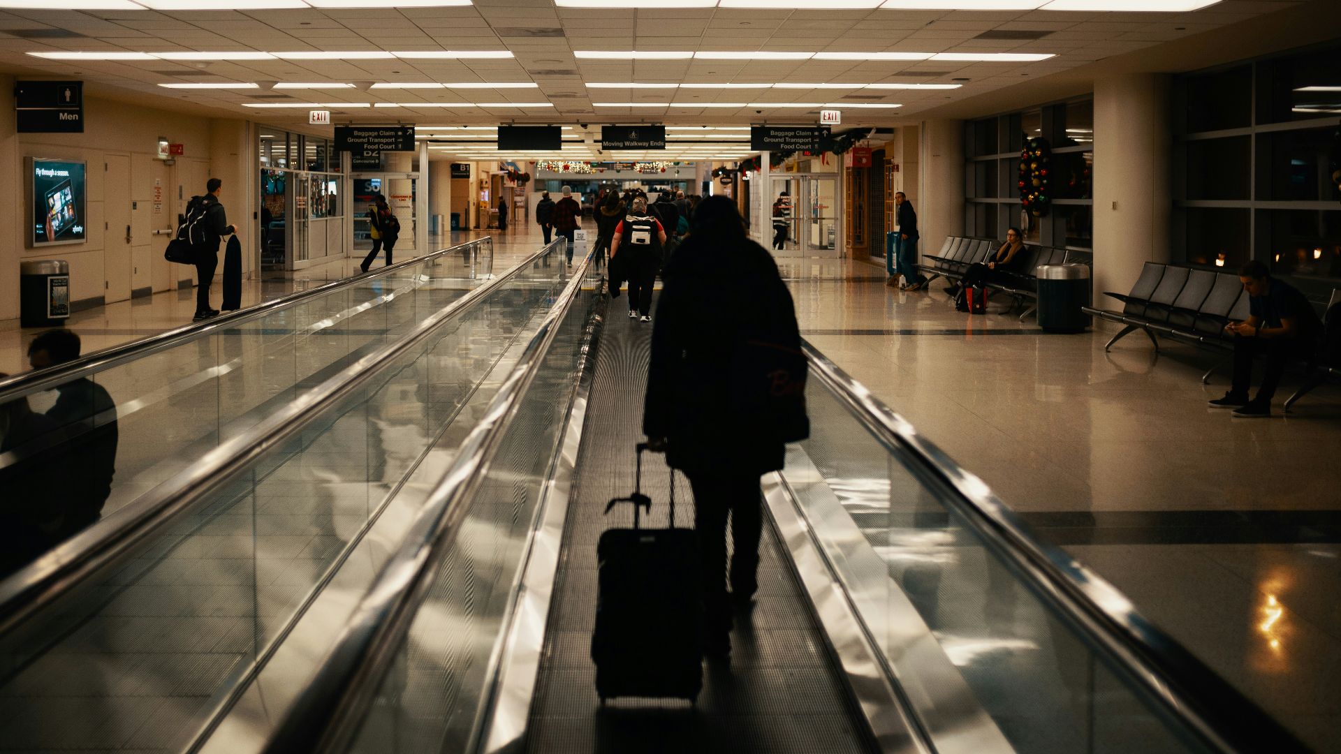 walking man holding luggage
