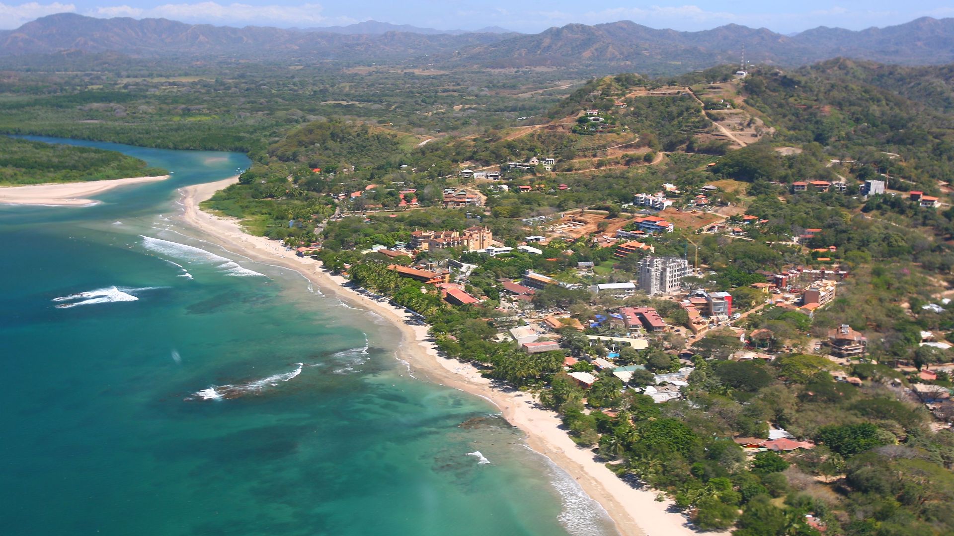 2007 Costa Rica aerial photo of Playa Tamarindo and River mouth showing the town and beach of Tamarindo and the Pacific Ocean