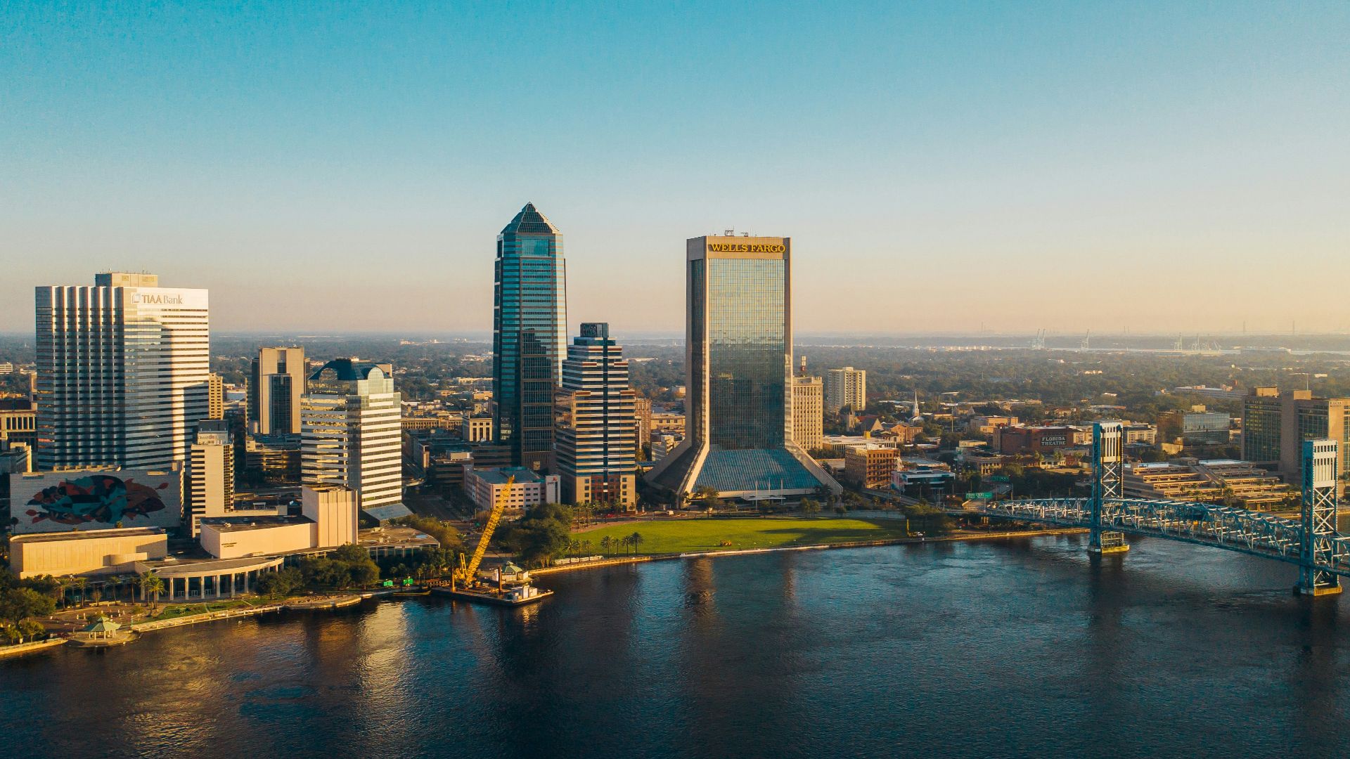 city skyline under blue sky during daytime