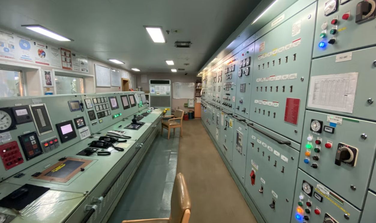 a control room filled with lots of electronic equipment