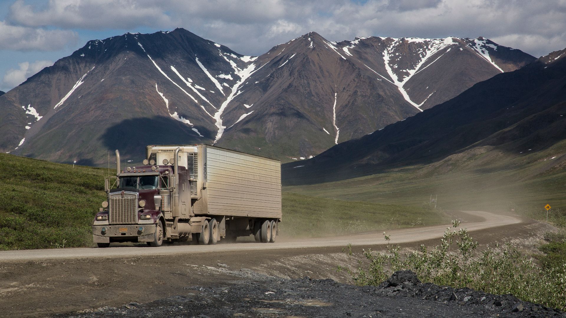 Semi-truck on the Dalton Highway. Photo by Bob Wick