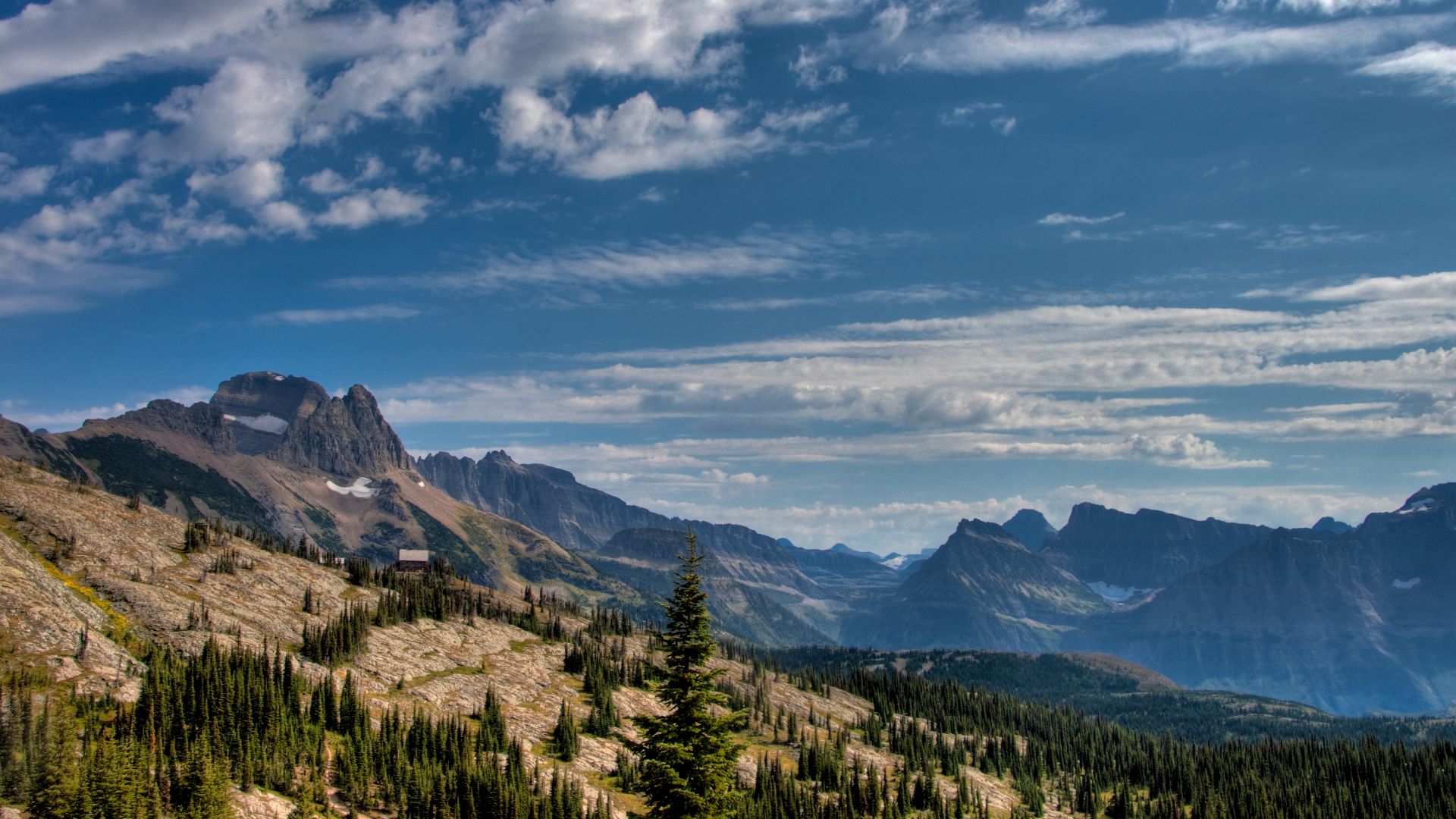 Granite Park Chalet on the left. Mount Gould on the left.