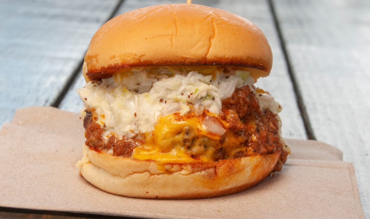 Delicious Carolina cheeseburger with all the fixings on a bun