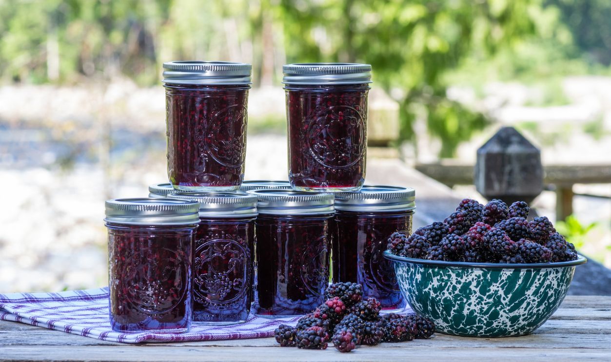 Jars of homemade marionberry or blackberry preserves or jam
