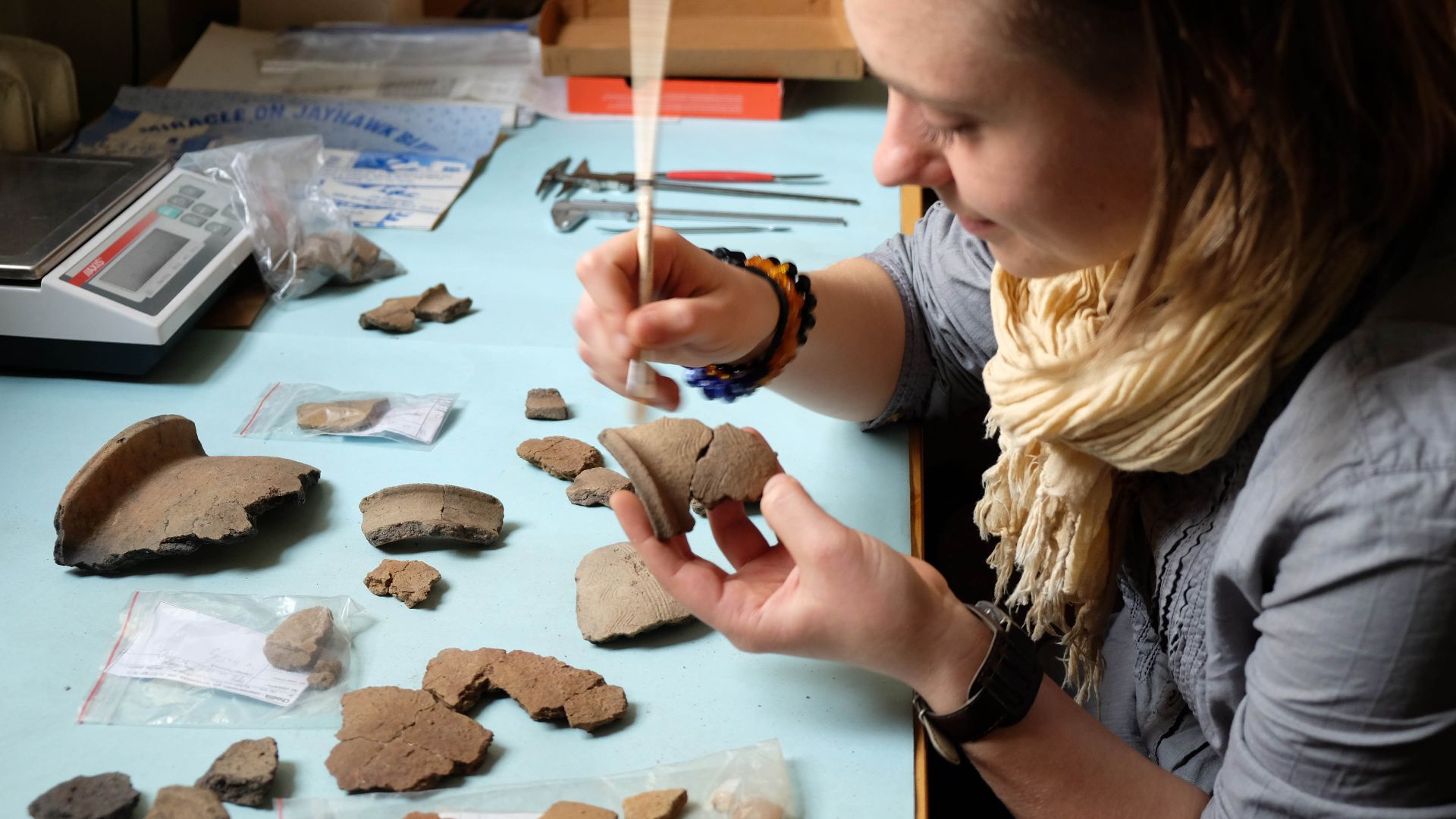 Archaeologist from Chodlik Archaeological Mission of the Institute of Archaeology and Ethnology Polish Academy of Sciences working with archaeological finds from early medieval burials discovered in Chodlik - small village located in Eastern Poland famous