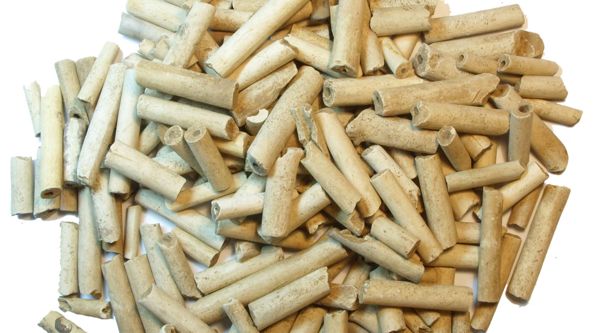 172 clay pipe stems. The stems are both sub-circular in section with a central hole running the length of the stem. The stems are made from moulded fine white clay. Pushing a wire rod through the stem while it is still in the mould creates the hole in the