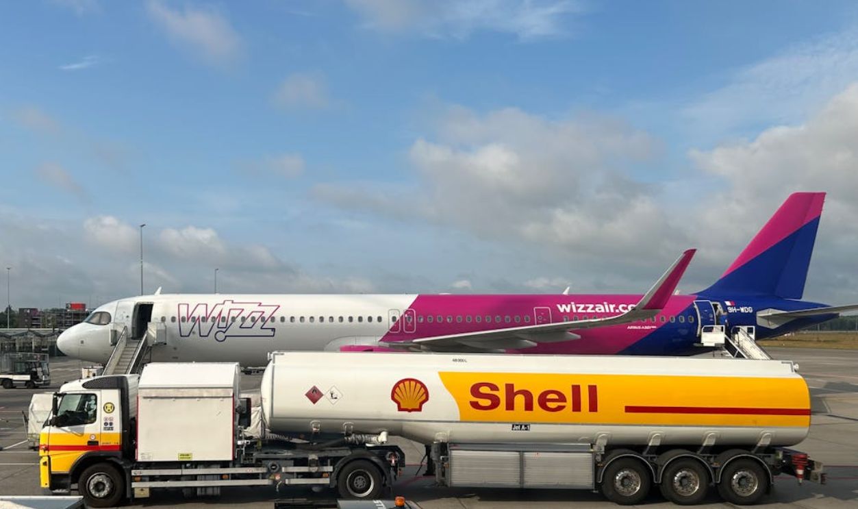 Airplane Refueling at Airport with Fuel Truck