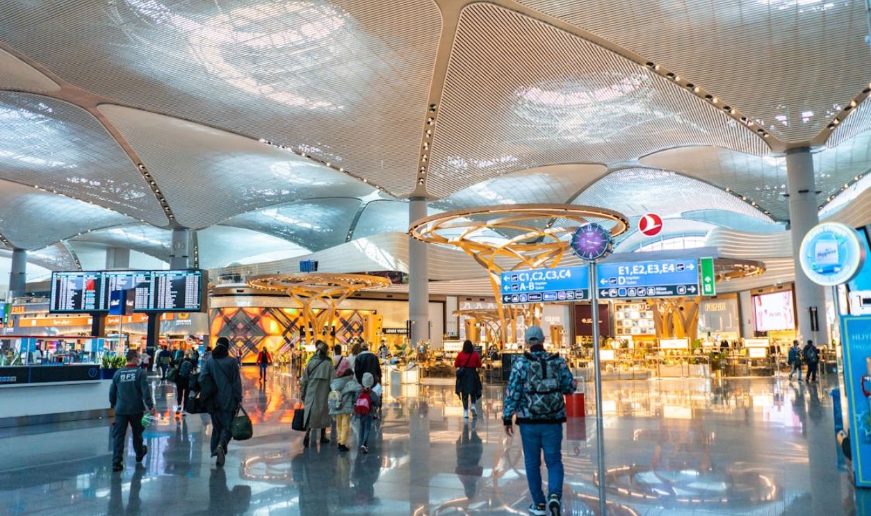 People Walking Inside an Airport Building