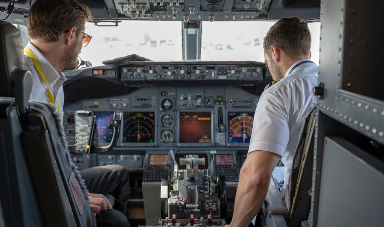 Two Pilots Sitting Inside Plane