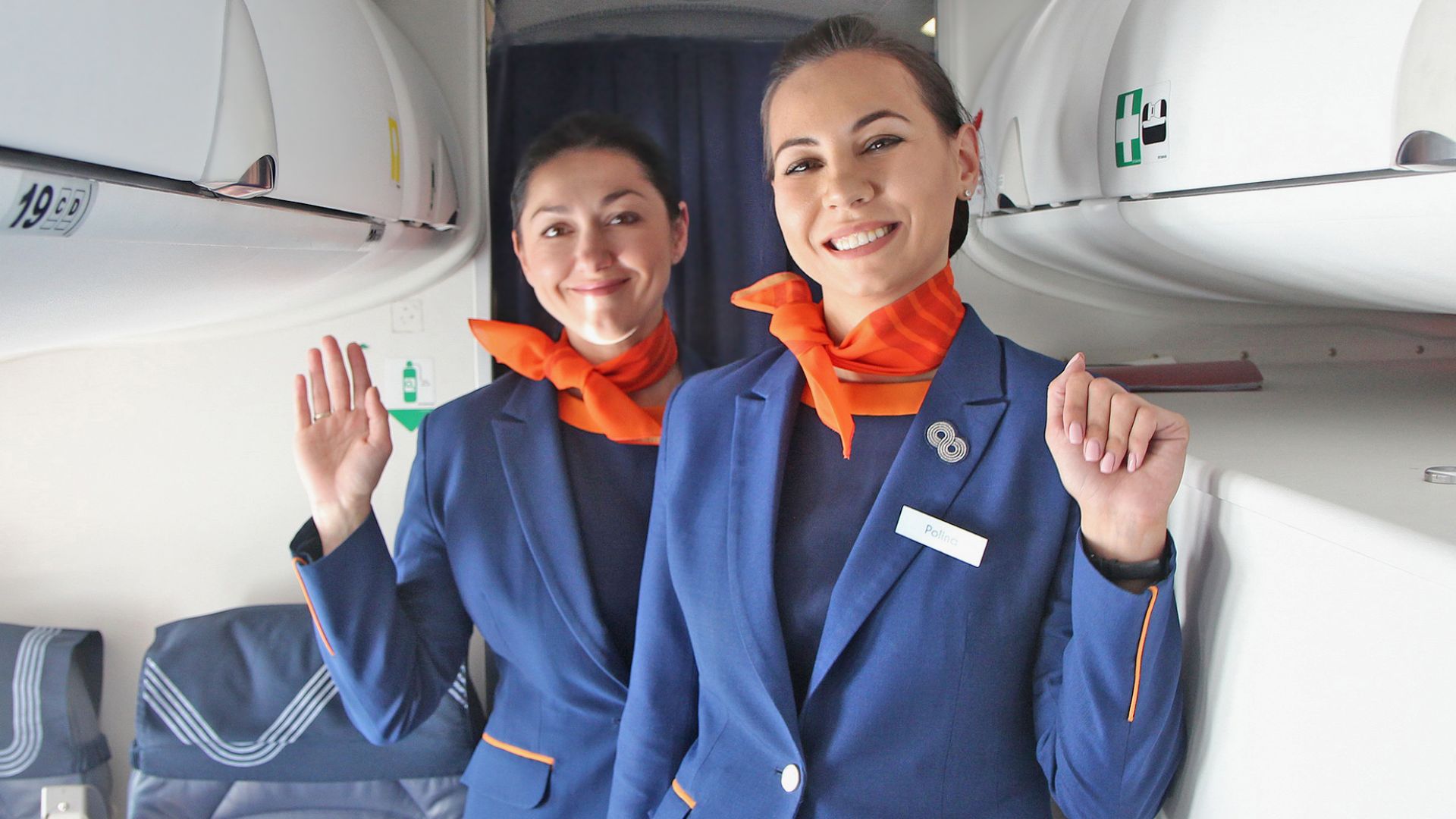 File:Flight attendant Aurora Airlines.jpg