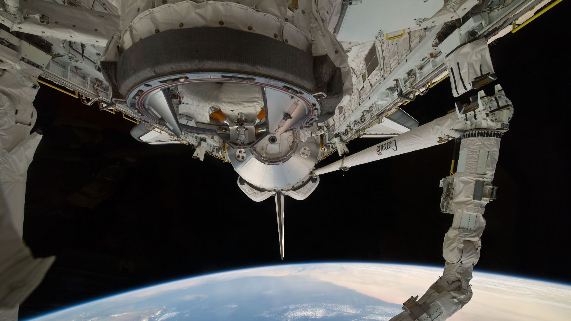 File:STS-131 flight day two Discovery's RMS and OBSS.jpg