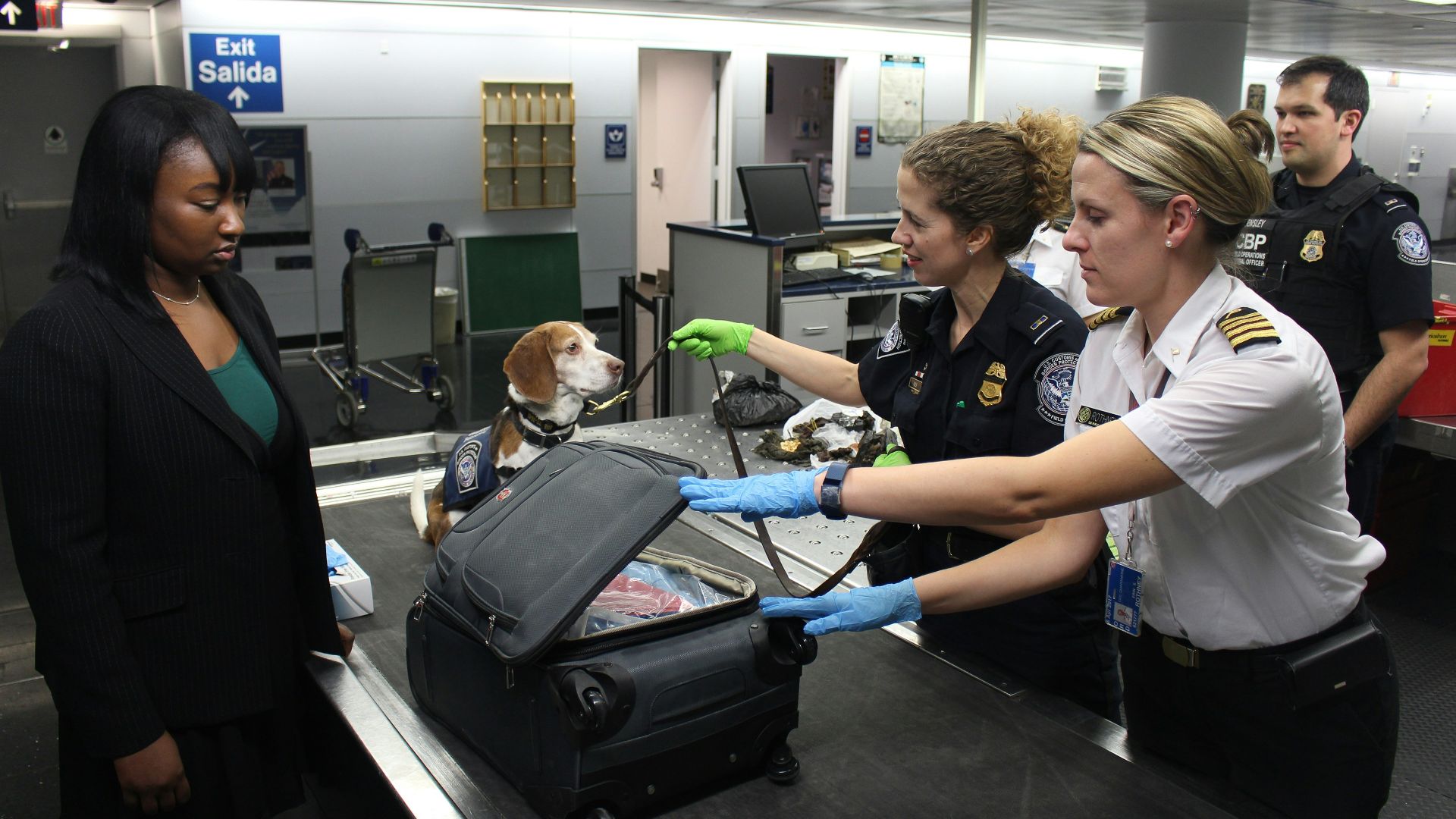 woman in black crew neck t-shirt standing beside woman in white t-shirt