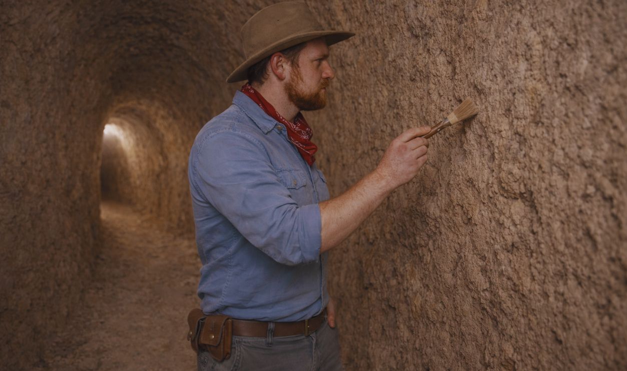 archaeologist inside a tunnel