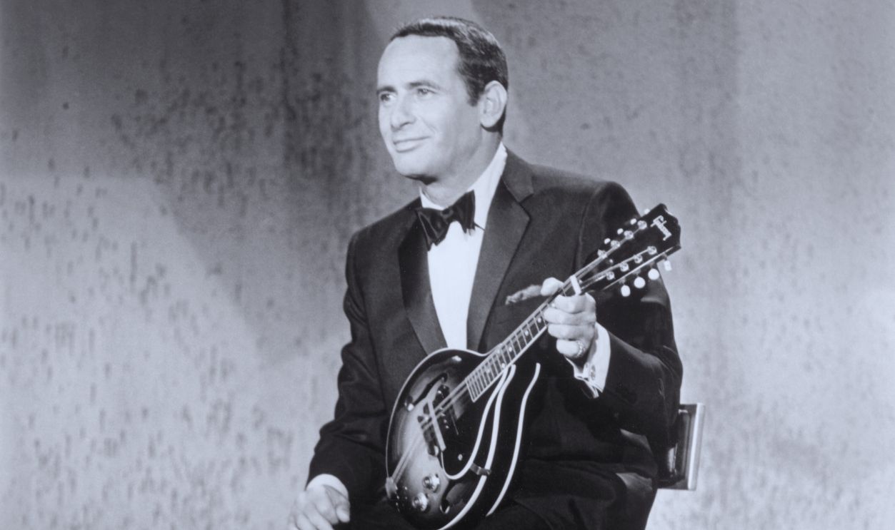 Gettyimages - 526810614, Joey Bishop Seated W/Mandolin/Tuxedo (Original Caption) Actor/comedian Joey Bishop is shown seated on a chair, holding a mandolin-like instrument. He wears a tuxedo in this full-length undated photograph. Ca. 1940s-1950s.